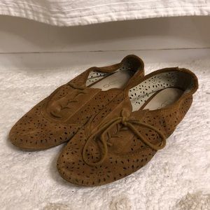 Tan oxford-style shoes